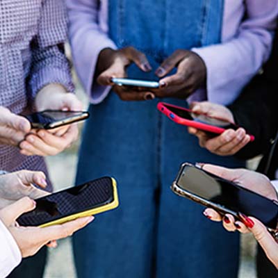 People holding mobile phones