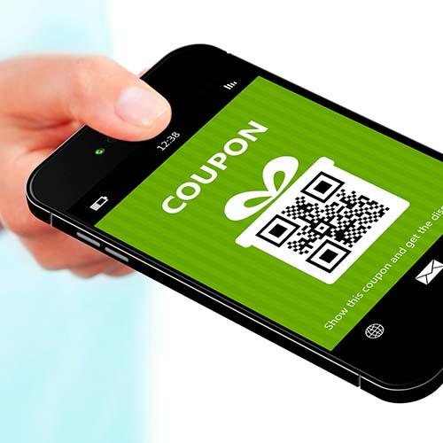 Smartphone with mobile coupon displayed.