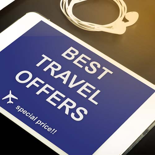 iPad displaying the words best travel offers.